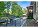 Inviting outdoor patio with comfortable seating and a view of the private backyard at 2610 Chadwick Rd, Marietta, GA 30066