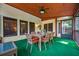 The screened-in porch has ample room for a large table and chairs, and additional seating at 2610 Chadwick Rd, Marietta, GA 30066