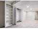 Finished basement featuring built-in shelves, closet, carpet floors and recessed lighting at 3006 Alberta Dr, Marietta, GA 30062