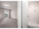 Well lit bathroom with a closet, a sink, and a mirror at 3006 Alberta Dr, Marietta, GA 30062