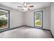 Bedroom with carpet floors and two large windows at 3006 Alberta Dr, Marietta, GA 30062