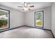 This spacious bedroom features neutral paint, plush carpet, and two large windows at 3006 Alberta Dr, Marietta, GA 30062