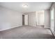 This spacious bedroom features neutral paint, plush carpet, and multiple windows at 3006 Alberta Dr, Marietta, GA 30062