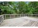 Spacious backyard deck with wooden railing at 3006 Alberta Dr, Marietta, GA 30062