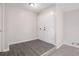Entryway with gray flooring, white walls, closet doors, and a transition to carpet at 3006 Alberta Dr, Marietta, GA 30062