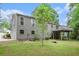 Exterior view of home with deck, nice yard, and neutral color scheme at 3006 Alberta Dr, Marietta, GA 30062