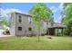 Two-story house with gray siding, a spacious backyard and a deck, perfect for outdoor entertaining at 3006 Alberta Dr, Marietta, GA 30062