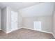 Bedroom featuring neutral paint, plush carpet, and a closet door at 4041 Ash Tree St, Snellville, GA 30039
