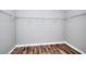 Walk-in closet provides ample storage with wire shelving and wood-look floors at 4041 Ash Tree St, Snellville, GA 30039
