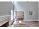 Spacious living room features hardwood floors, a fireplace, and plenty of natural light at 4041 Ash Tree St, Snellville, GA 30039