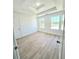 Bedroom featuring wood-look floors, recessed lighting and a double window at 681 Burtons Cv, Hampton, GA 30228