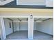 Attached three car garage with epoxy flooring at 681 Burtons Cv, Hampton, GA 30228