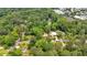 A neighborhood of homes sits amongst a verdant forest, showcasing the area's natural beauty at 124 Chaseland Rd, Atlanta, GA 30328