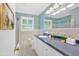 Classic bathroom featuring a tiled shower, large counter, and white vanity at 124 Chaseland Rd, Atlanta, GA 30328