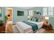 Bright bedroom with an ensuite bath, hardwood floors, and plantation shutters at 124 Chaseland Rd, Atlanta, GA 30328
