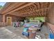 Covered carport featuring exposed wooden beams, and a vintage vehicle at 124 Chaseland Rd, Atlanta, GA 30328