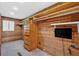 Wood-paneled walk-in closet with built-in shelving and closet rod at 124 Chaseland Rd, Atlanta, GA 30328