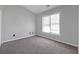 Bedroom with a window providing lots of natural light at 145 Silver Mine Trl, Austell, GA 30168