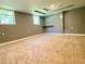 This is a spacious bedroom with two large windows and a tray ceiling with recessed lighting at 148 Paradise Xing, Douglasville, GA 30134