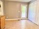 View of the kitchen and breakfast nook leading to the backyard and closet at 148 Paradise Xing, Douglasville, GA 30134