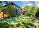 Beautiful home with a putting green and mature trees, blending recreation with natural beauty at 265 Tara Trl, Atlanta, GA 30327