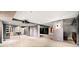 Finished basement with a glass enclosed wine cellar and kitchenette at 265 Tara Trl, Atlanta, GA 30327