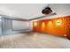 Finished basement boasts a home theater and an accent wall with unique lighting at 265 Tara Trl, Atlanta, GA 30327