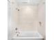 Bright bathroom with white tile and tub combination at 265 Tara Trl, Atlanta, GA 30327