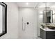 Contemporary bathroom featuring frameless glass shower, bold tile work, and modern vanity with vessel sink at 265 Tara Trl, Atlanta, GA 30327