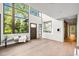 Elegant foyer with soaring ceilings, large windows, hardwood floors, and stylish decor at 265 Tara Trl, Atlanta, GA 30327