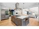 Modern kitchen boasts a large island, stainless steel appliances, and an open floor plan at 265 Tara Trl, Atlanta, GA 30327