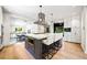 Bright, open kitchen with a large island, modern appliances, and seating for four at 265 Tara Trl, Atlanta, GA 30327
