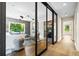 Bright and open living room with hardwood floors and access to other rooms at 265 Tara Trl, Atlanta, GA 30327