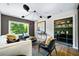 Cozy living room with natural light, stylish decor, and a large window view at 265 Tara Trl, Atlanta, GA 30327