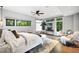 Sun-filled main bedroom features many windows and modern fixtures at 265 Tara Trl, Atlanta, GA 30327