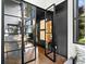 Striking office entry with sleek black frames and glass doors, creating an open and modern feel at 265 Tara Trl, Atlanta, GA 30327