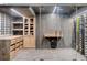 Climate controlled wine cellar with custom wood cabinets and herringbone floors at 265 Tara Trl, Atlanta, GA 30327