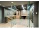 Climate controlled wine cellar with herringbone floors and custom wood cabinets at 265 Tara Trl, Atlanta, GA 30327