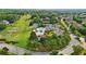 Beautiful aerial view showcasing community amenities including a pool, tennis courts, and a soccer field at 2871 Trailing Ivy Way, Buford, GA 30519