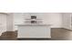 Open kitchen featuring a large island with granite countertops and stainless steel appliances at 641 Kimberwick Dr, Locust Grove, GA 30248