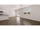 Open concept living room and kitchen area featuring modern finishes, stainless appliances, and ample space at 641 Kimberwick Dr, Locust Grove, GA 30248