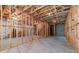 Unfinished basement with exposed framing, concrete floor, and visible utilities at 980 Windsor Place Cir, Grayson, GA 30017