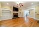 The living room features hardwood floors, a fireplace with built-in shelving, and plenty of natural light at 980 Windsor Place Cir, Grayson, GA 30017