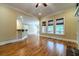 Spacious living area with hardwood floors, fireplace, and natural light at 980 Windsor Place Cir, Grayson, GA 30017