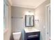 Stylish bathroom featuring a modern vanity, mirror and soft lighting at 1477 Triple Creek Nw Ct, Kennesaw, GA 30144