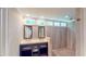 Modern bathroom with double vanity and a walk-in shower at 1477 Triple Creek Nw Ct, Kennesaw, GA 30144