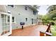 Home features a new wooden deck with a grill for outdoor entertaining at 1477 Triple Creek Nw Ct, Kennesaw, GA 30144