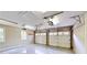 Spacious two car garage features bright lighting and wall storage at 1477 Triple Creek Nw Ct, Kennesaw, GA 30144