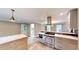 Contemporary kitchen with stainless steel appliances, gray cabinets, and island seating at 1477 Triple Creek Nw Ct, Kennesaw, GA 30144