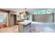 Open concept kitchen with modern gray cabinets, large island, and stainless steel appliances at 1477 Triple Creek Nw Ct, Kennesaw, GA 30144